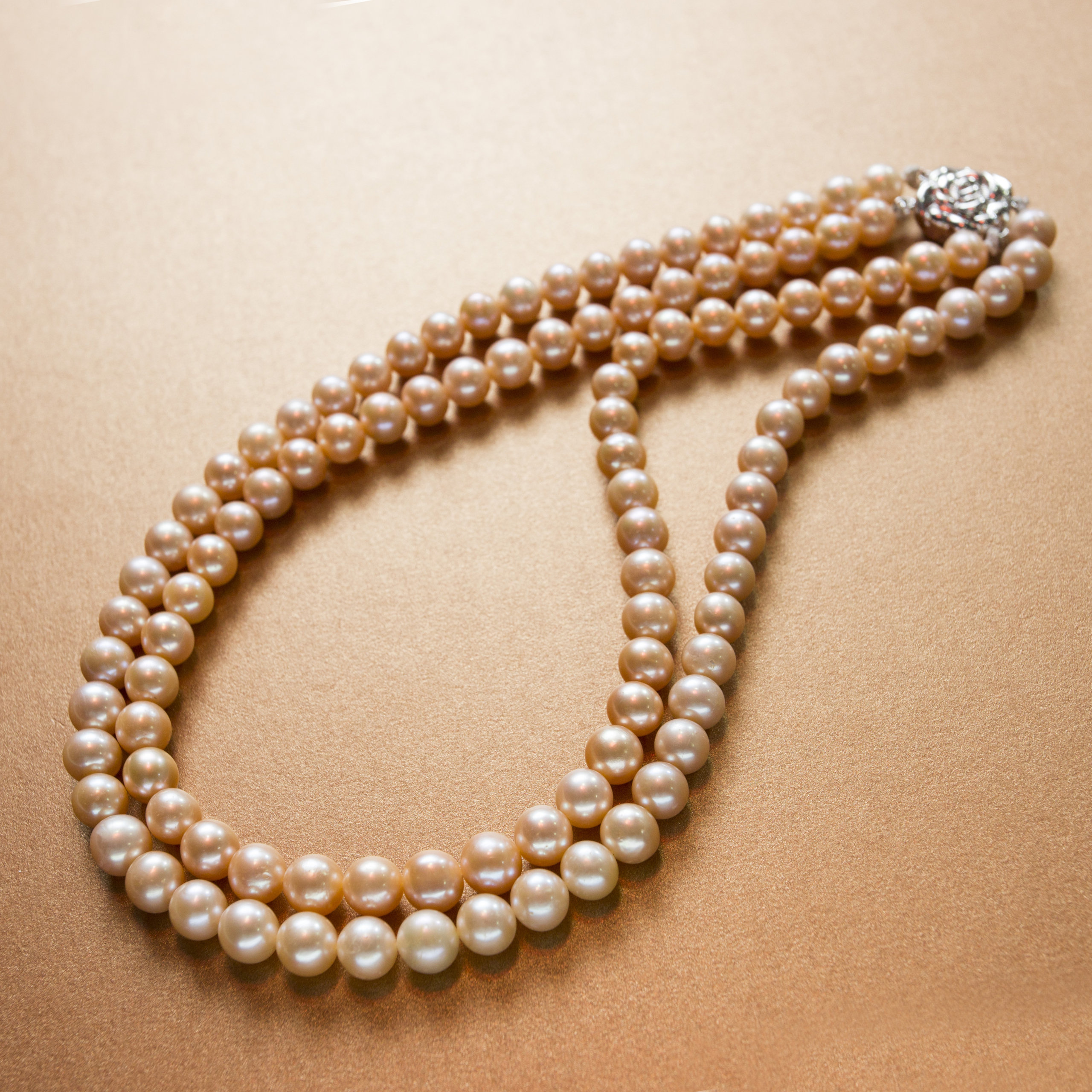 Classic double strand white pearl necklace- with silver floral clasp