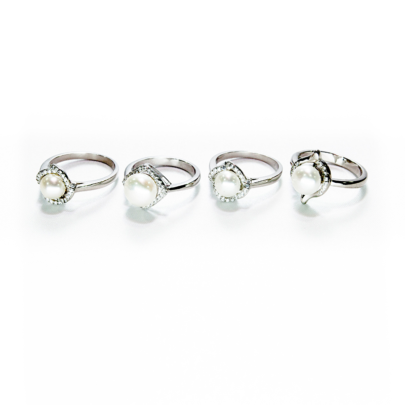 Conch inspired diamond lustre single pearl silver pearl set