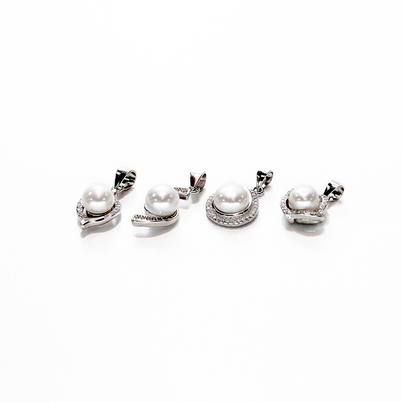 Conch inspired diamond lustre single pearl silver pearl set