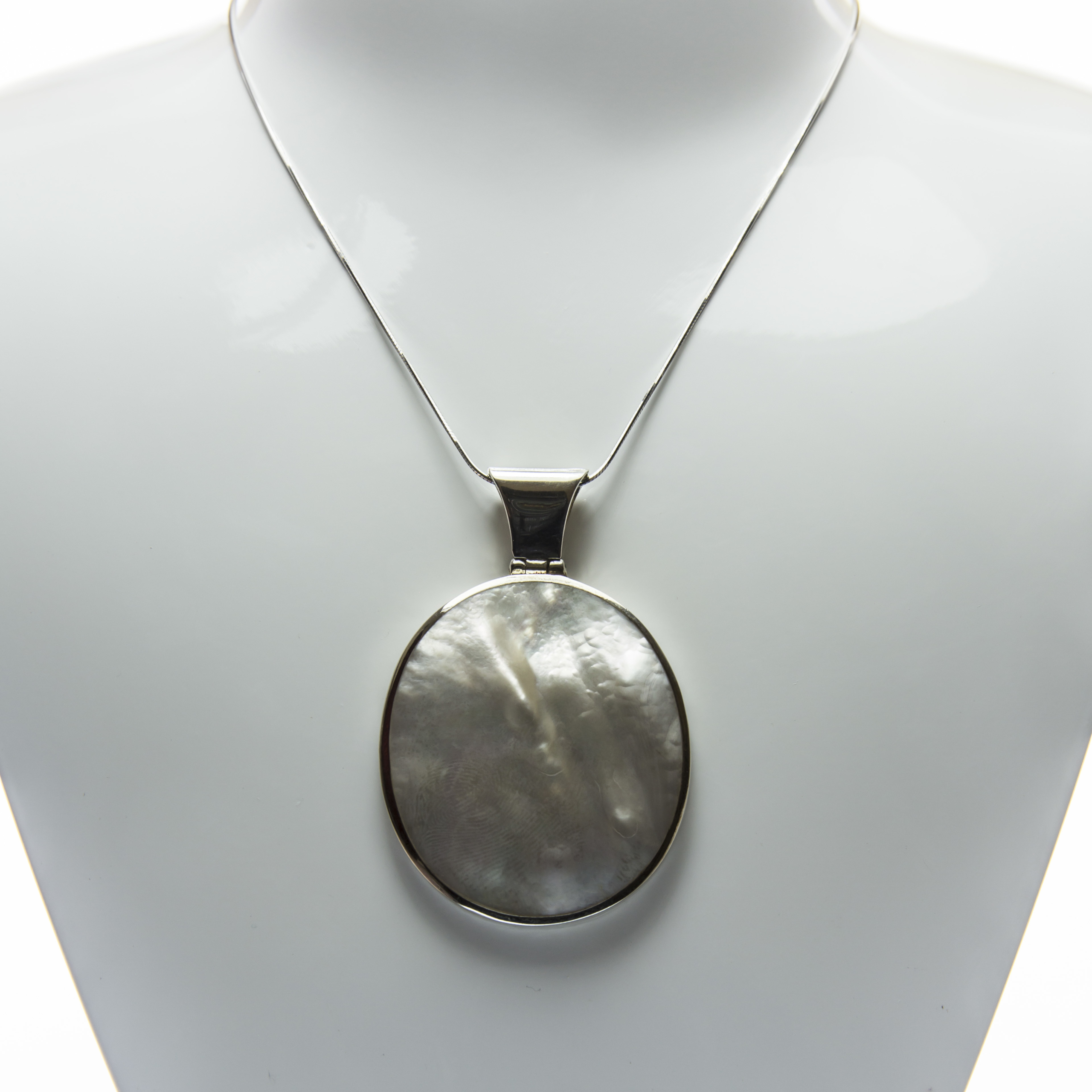 Oval shaped Mother of Pearl Fine Silver Pendant